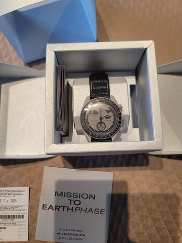 Authentic omega swatch - x,